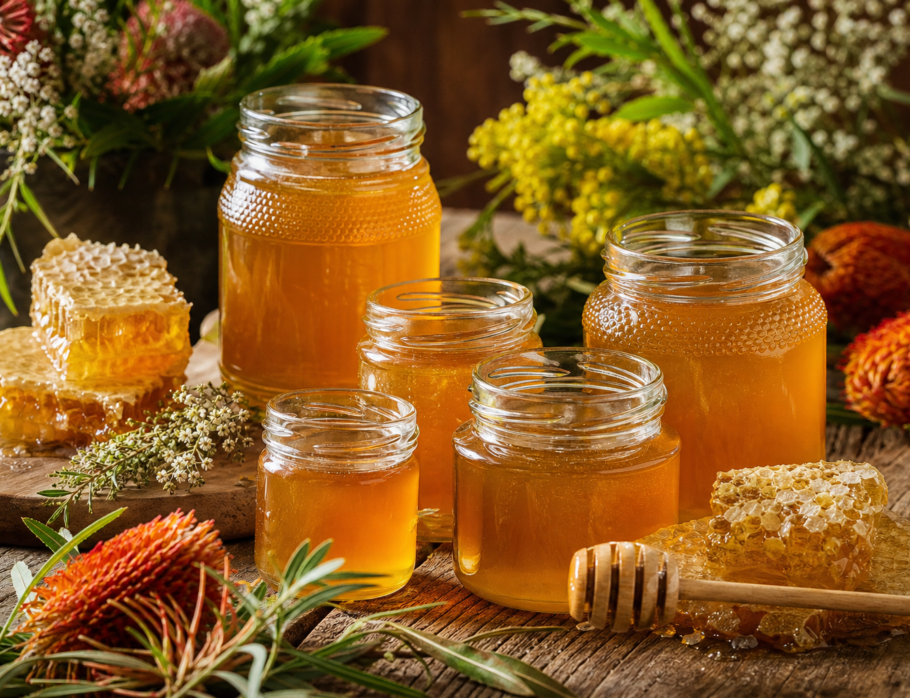 Buy raw honey online Gold Coast — glass jars of Queensland raw honey with native wildflowers