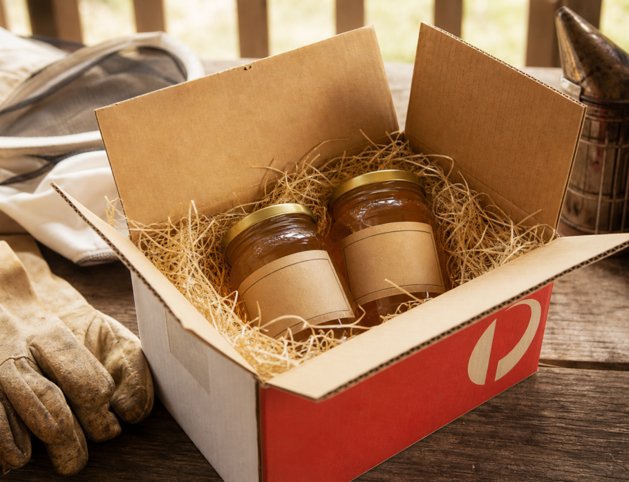 Jars of raw Queensland honey packed for Australia Post delivery