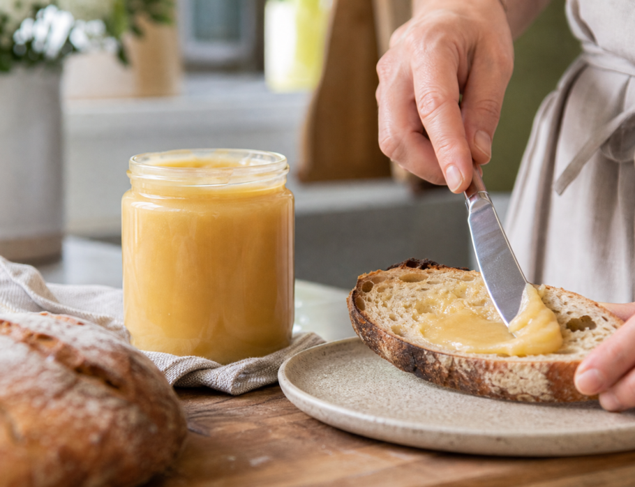 Creamed honey being spread on sourdough toast, Gold Coast honey producer